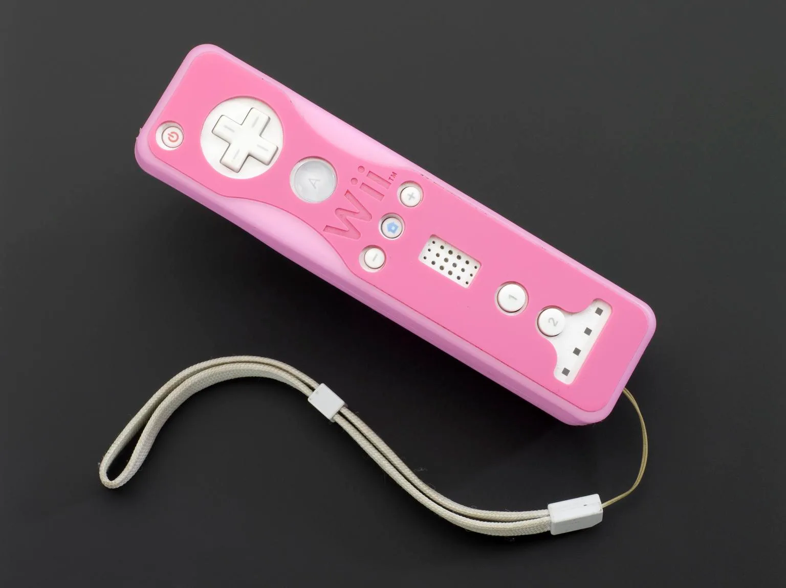 Wii Controller (Wii Controller with pink latex skin.)
