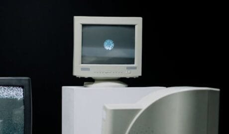 computer monitors on white table
