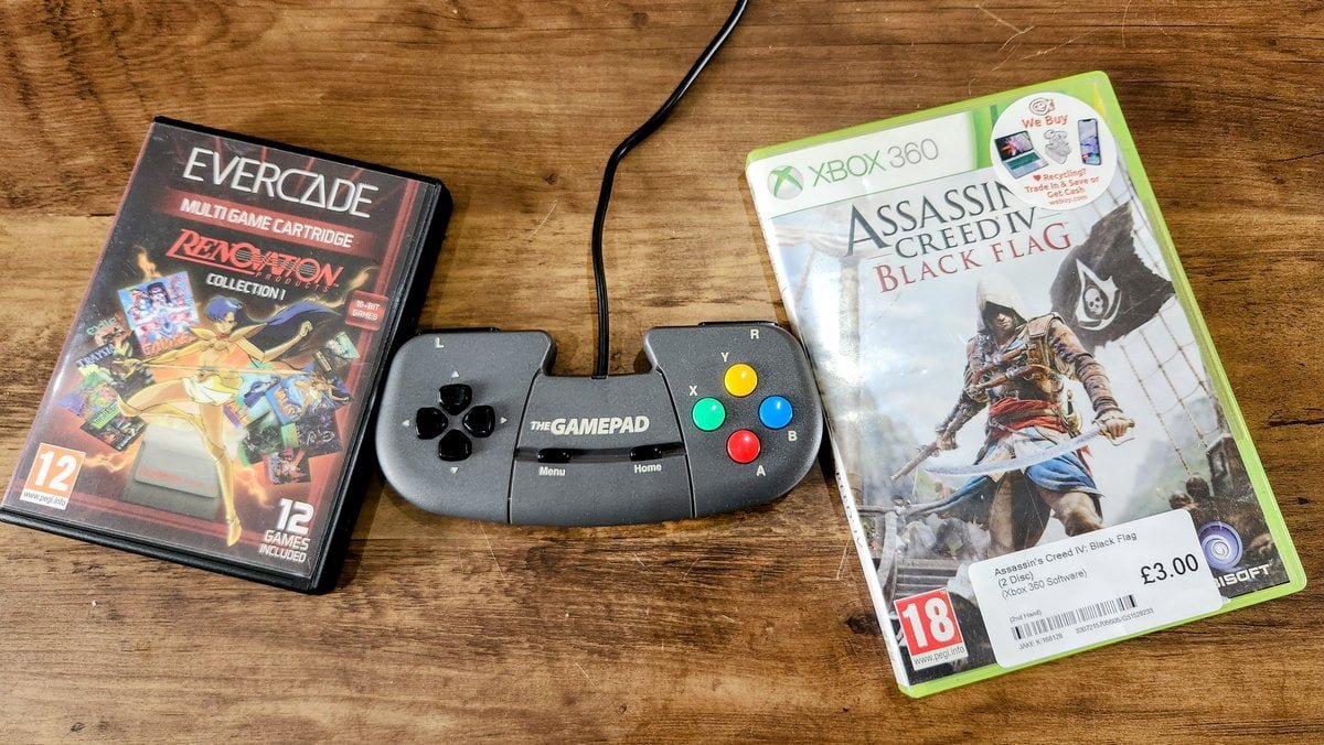 Evercade cart, Amiga controller,Assassin’s Creed IV: Black Flag