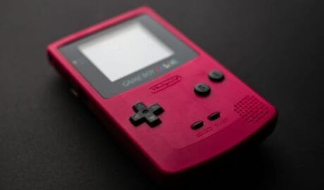 close up photo of red game boy console